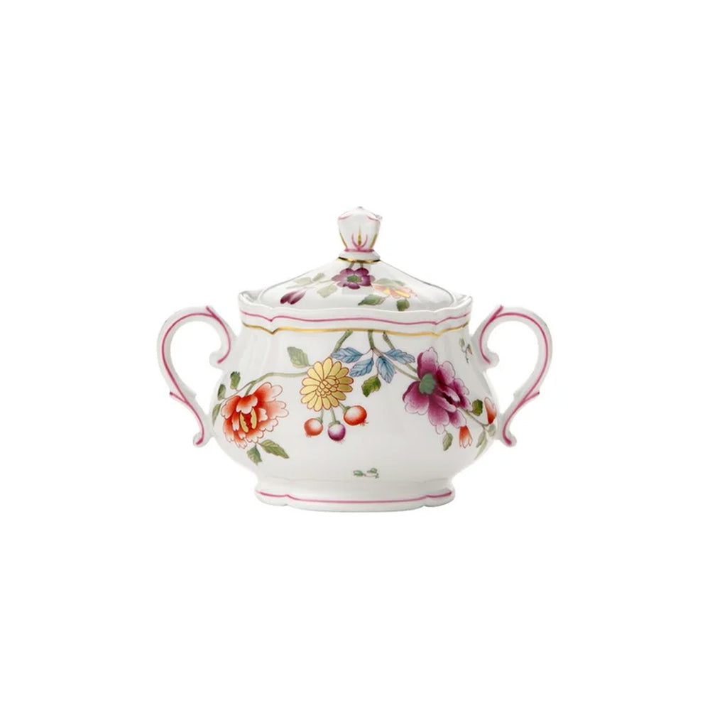 Front view of Granduca Coreana sugar bowl with cover, floral motif, double scroll handles, pink and gold trim