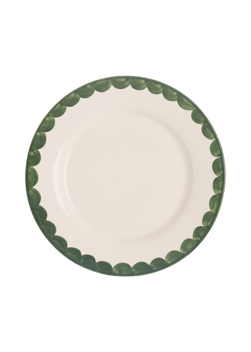 Top view of Green Scallop Dinner Plate showcasing green scalloped rim and recessed well with plain background