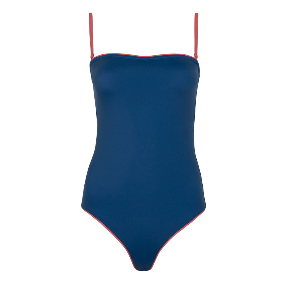 Front view of Women’s Newport navy one-piece with square neckline and thin removable coral straps on white background