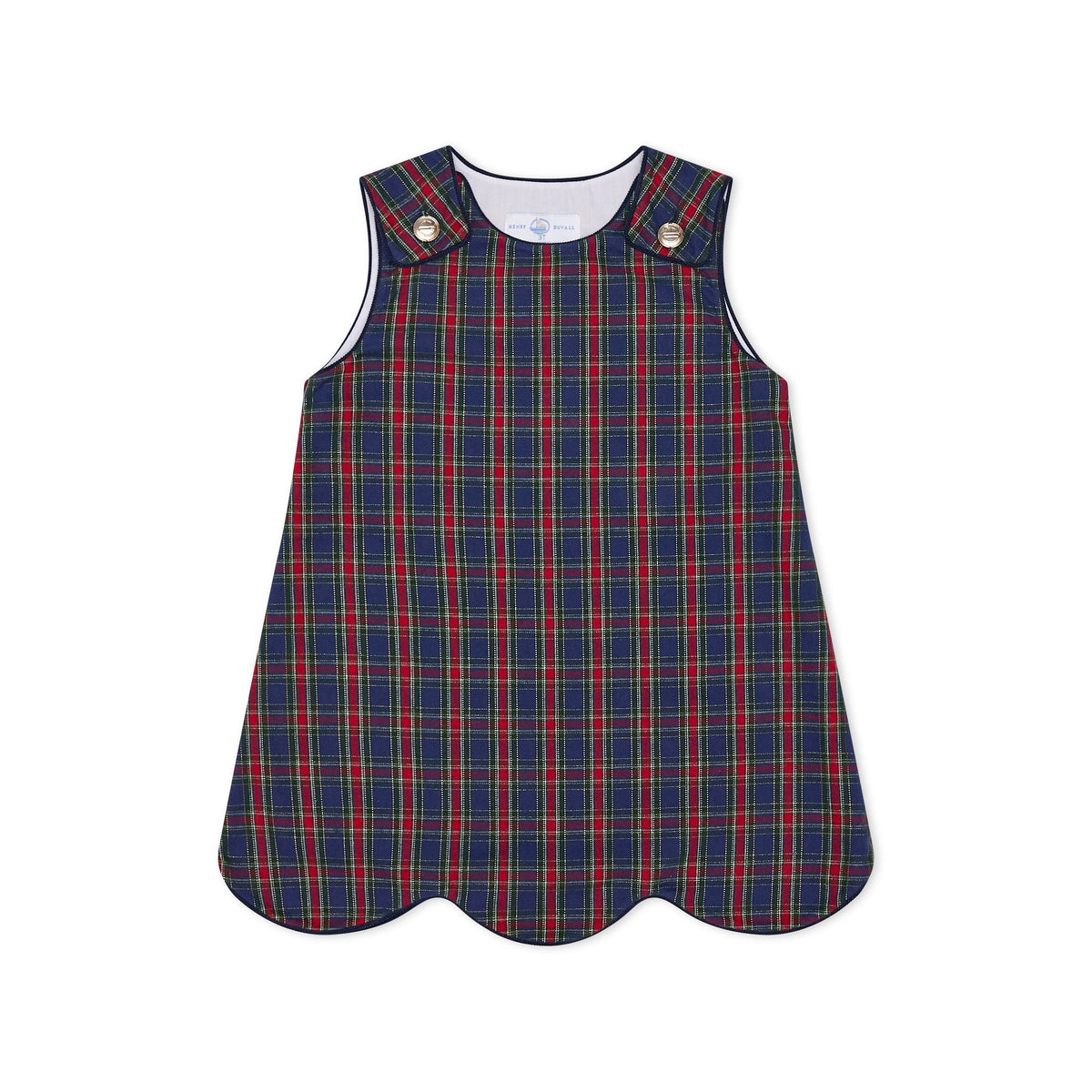 Henry Duvall Janie Jumper girls’ holiday dress in Tinsel Tartan, a navy, red and green plaid with subtle gold metallic thread, scalloped hem, navy piping and gold shoulder buttons.