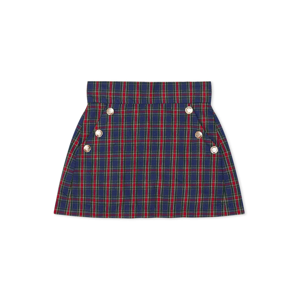 Girls’ Sadie Skirt in navy, red, and green Tinsel Tartan with subtle metallic thread, HD gold buttons, flat front, and A-line silhouette.