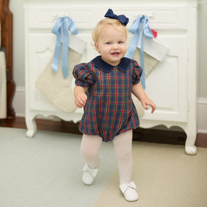 Girls’ Beatrice Bubble in navy, red, and green Tinsel Tartan with subtle metallic thread, Midnight Blue Corduroy scalloped collar, and scalloped sleeve trim.