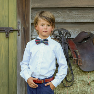 Boys’ pre-tied Baker Bow Tie in navy, red, and green Tinsel Tartan with subtle metallic thread and easy-on clasp.