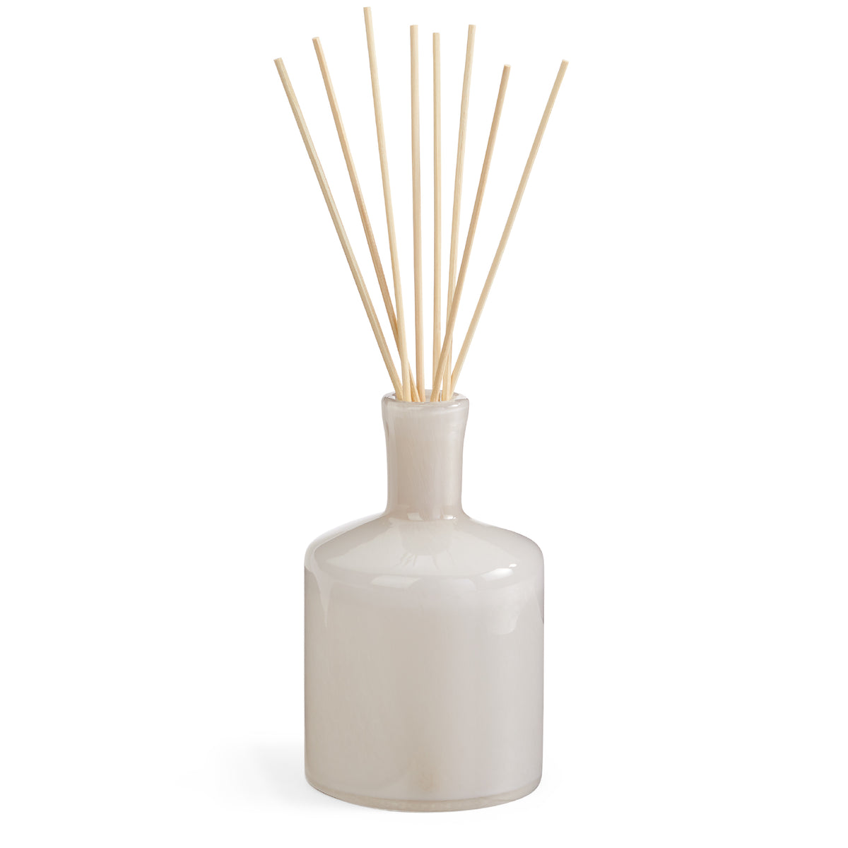 Front view of Star Magnolia Signature Reed Diffuser showcasing its white vessel and natural reeds with a white background