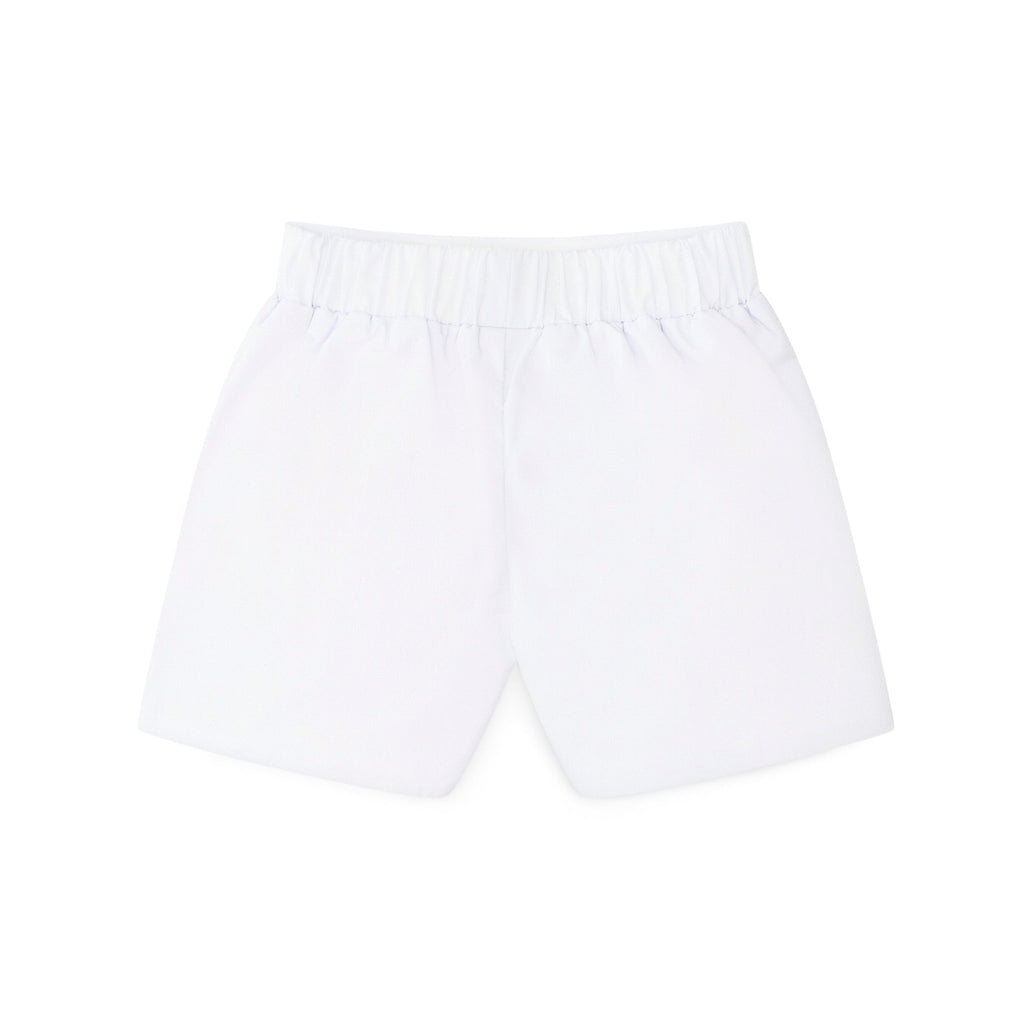Boys’ white spring dress shorts in crisp cotton with flat front and elastic back waistband, by Henry Duvall – versatile for Easter, portraits, and warm-weather occasions.