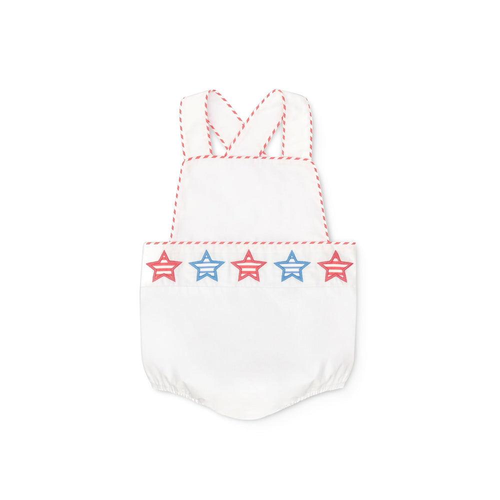 Henry Duvall unisex baby sunsuit in white with red and blue star appliqué and criss cross straps, classic patriotic outfit for Memorial Day, 4th of July, and summer occasions
