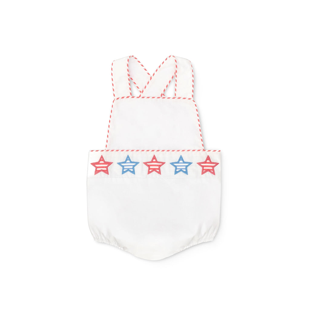 Henry Duvall unisex baby sunsuit in white with red and blue star appliqué and criss cross straps, classic patriotic outfit for Memorial Day, 4th of July, and summer occasions