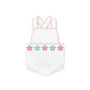 Henry Duvall unisex baby sunsuit in white with red and blue star appliqué and criss cross straps, classic patriotic outfit for Memorial Day, 4th of July, and summer occasions