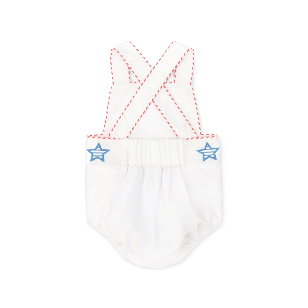 Henry Duvall unisex baby sunsuit in white with red and blue star appliqué and criss cross straps, classic patriotic outfit for Memorial Day, 4th of July, and summer occasions