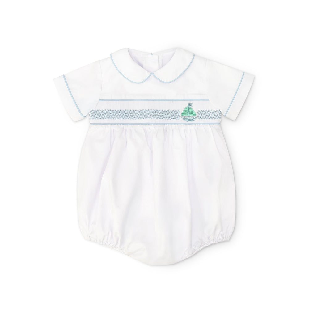 Henry Duvall Charlie Bubble for boys in white cotton with Bailey’s Bay Blue trim and smocked sailboat, classic summer baby boy outfit with Peter Pan collar