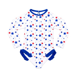 Henry Duvall Reese girls rashguard one piece in red white and blue star print, UPF 50+ long sleeve swimsuit for 4th of July, beach, and summer holidays