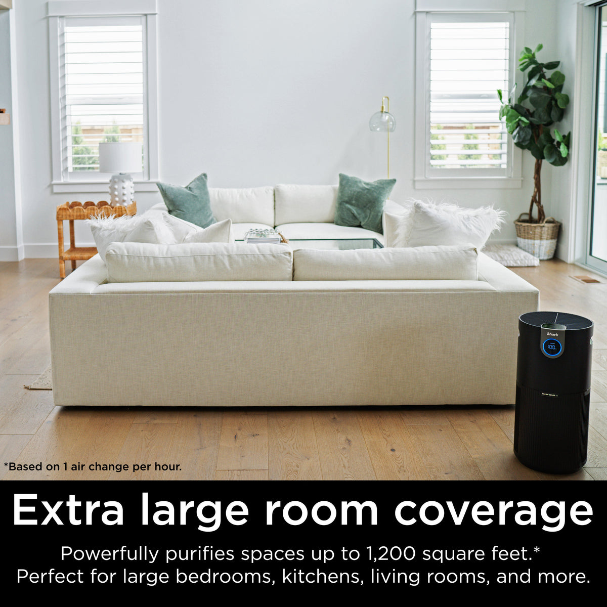Front view of Air Purifier MAX with NanoSeal HEPA in a living room, overlay text Extra large room coverage