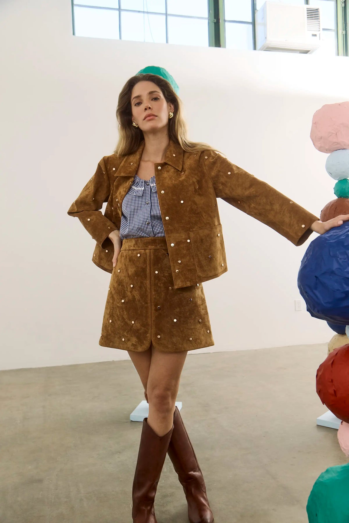The Dottie Mini Skirt in Saddle paired with matching Hanlin Jacket and Valene Blouse. 