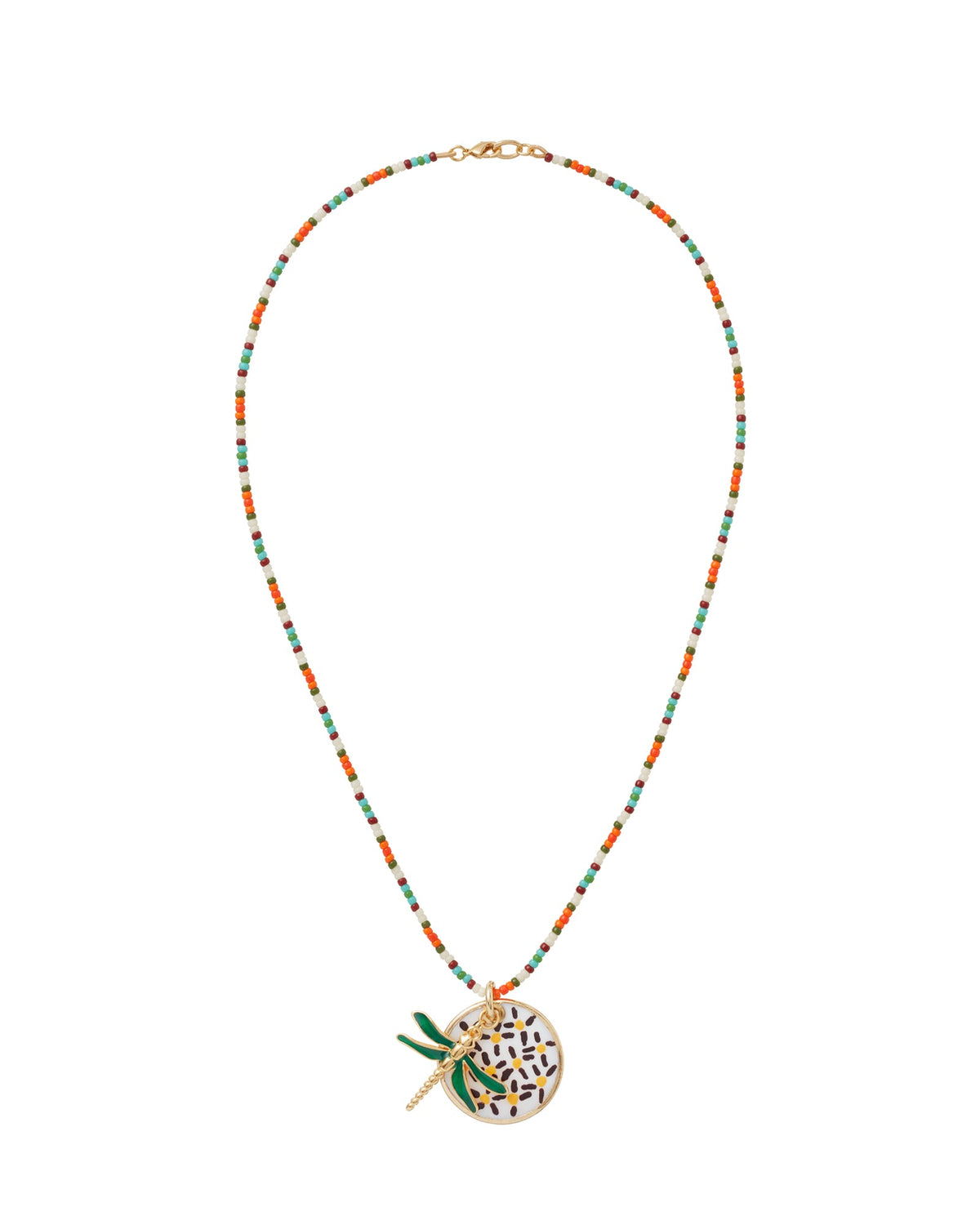 Flat lay of The Happy Place Necklace with multicolored seed beads, mother-of-pearl pendant with sprinkles and green dragonfly charm