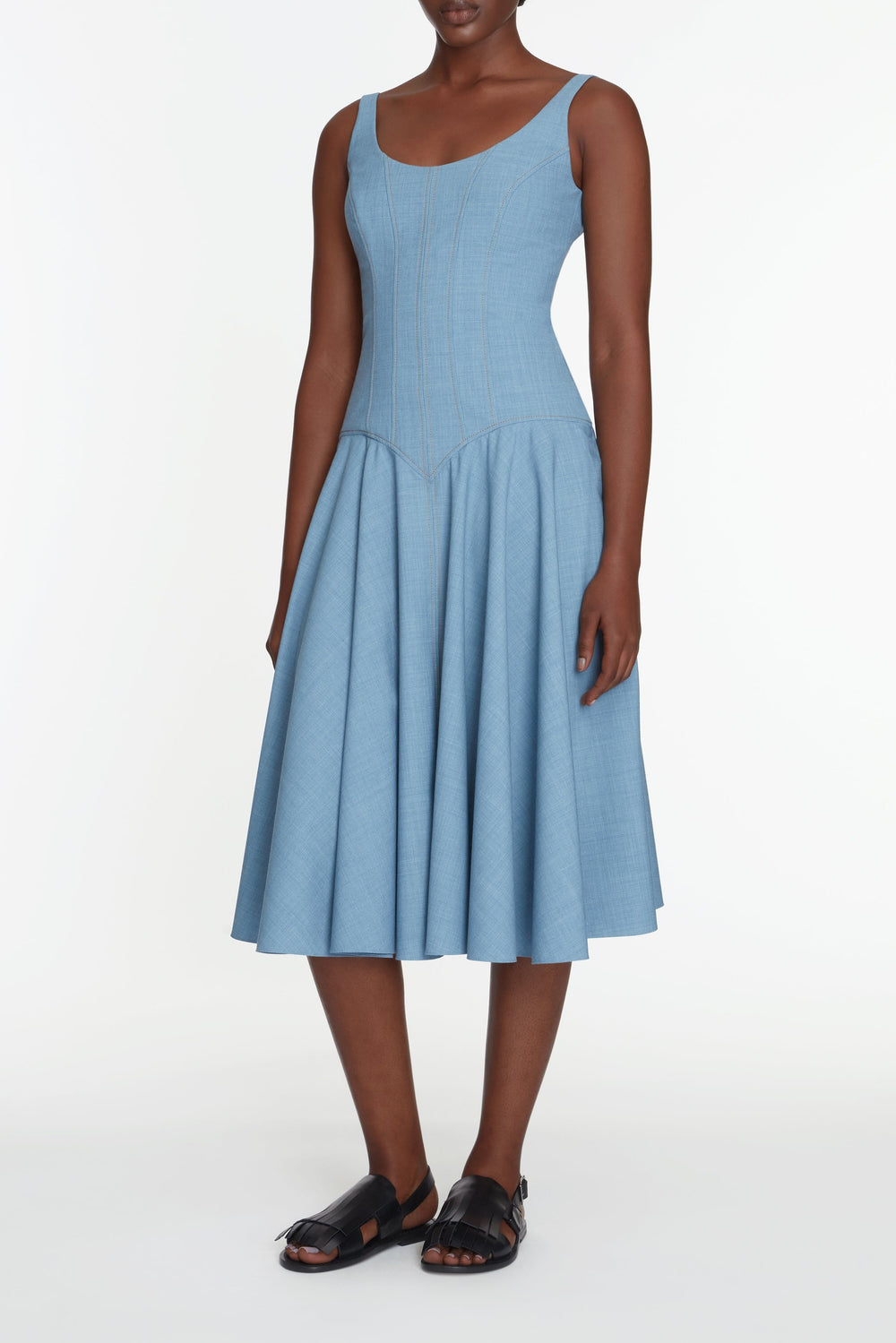 Front view of Harmoni dress in blue melange summer wool showcasing square neckline, fitted bodice and A-line skirt