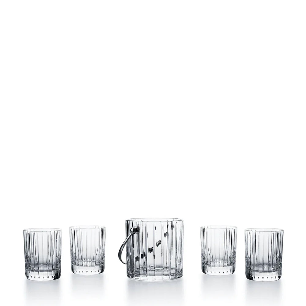 Front view of Harmonie on the Rocks tumblers and ice bucket showing vertical cut crystal pattern on white background