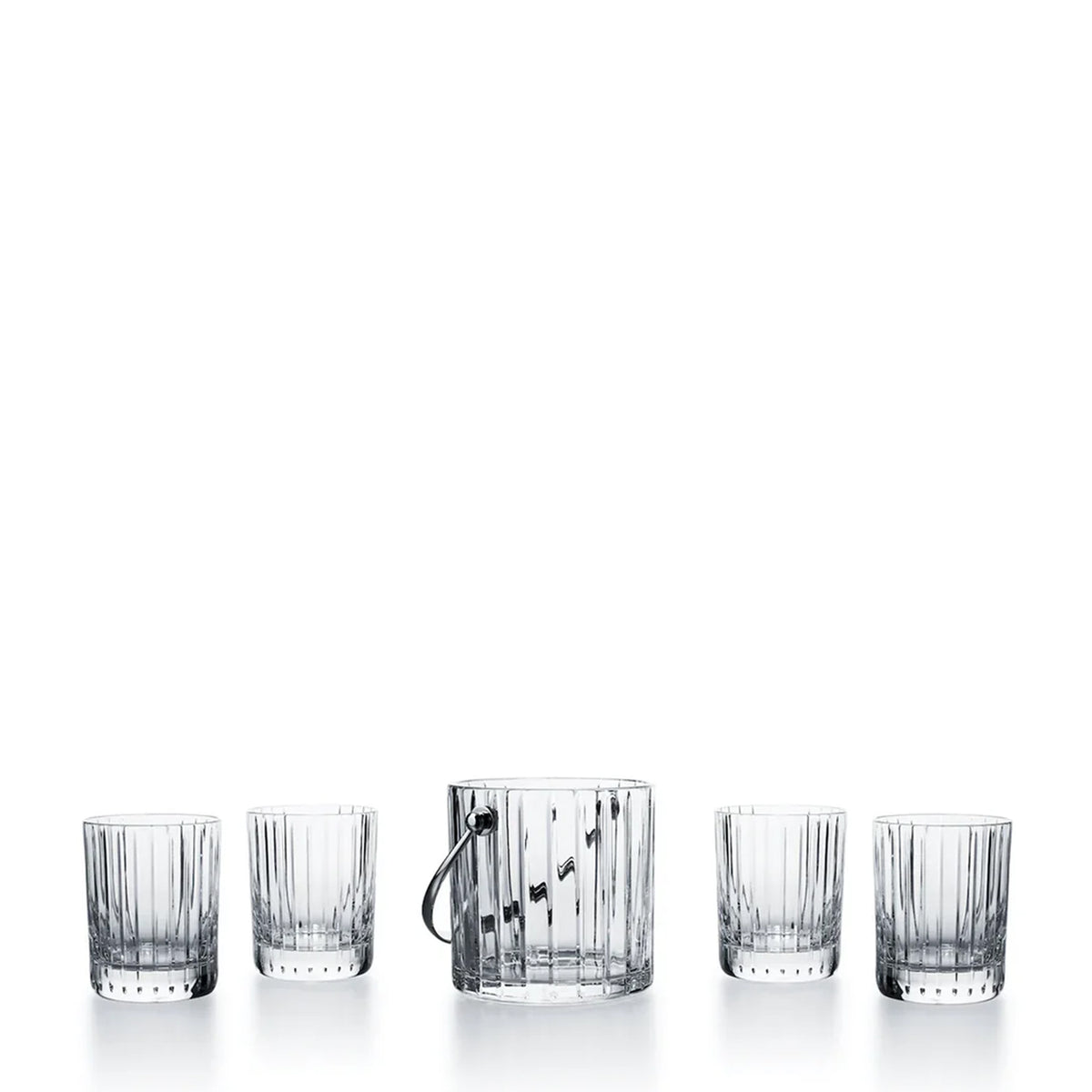 Front view of Harmonie on the Rocks tumblers and ice bucket showing vertical cut crystal pattern on white background