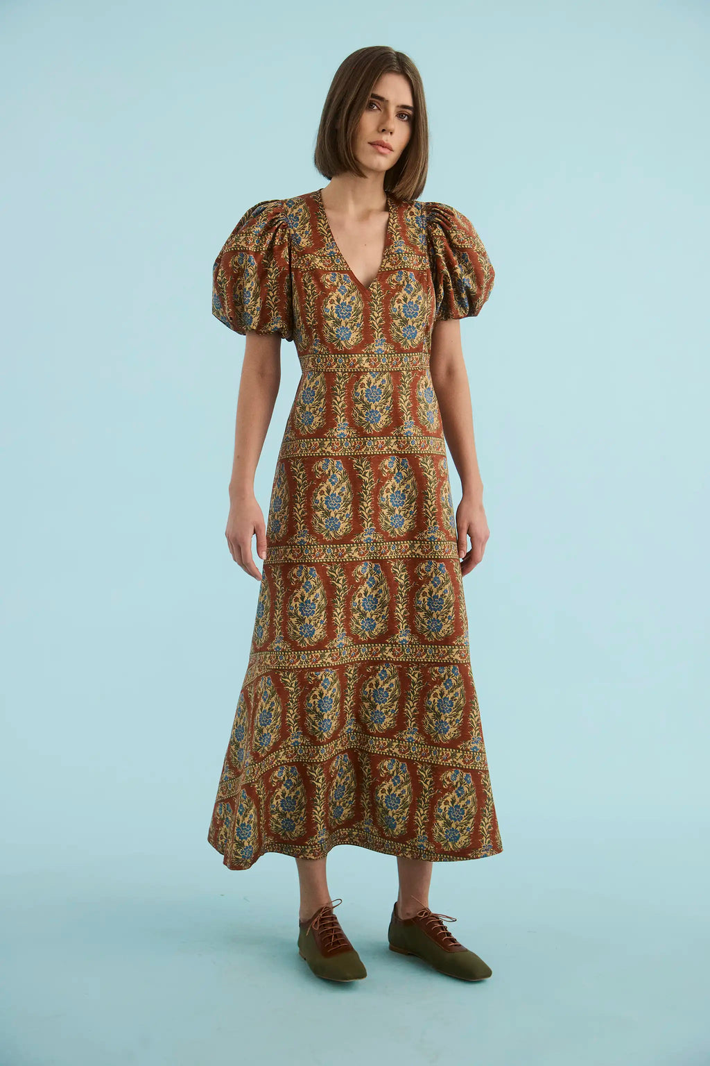 The Harrison Dress in Amber Glen Brown. 