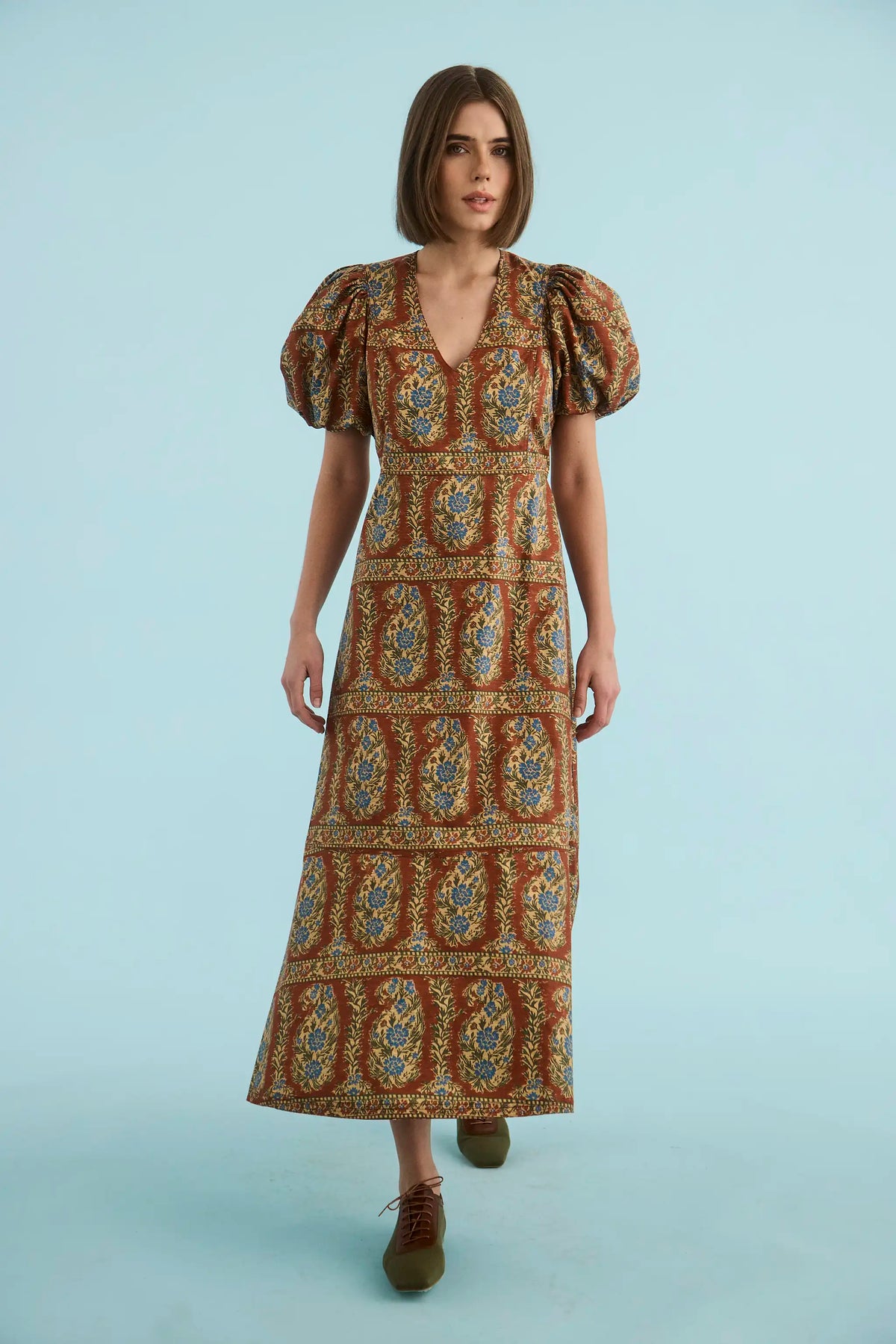 The Harrison Dress in Amber Glen Brown. 