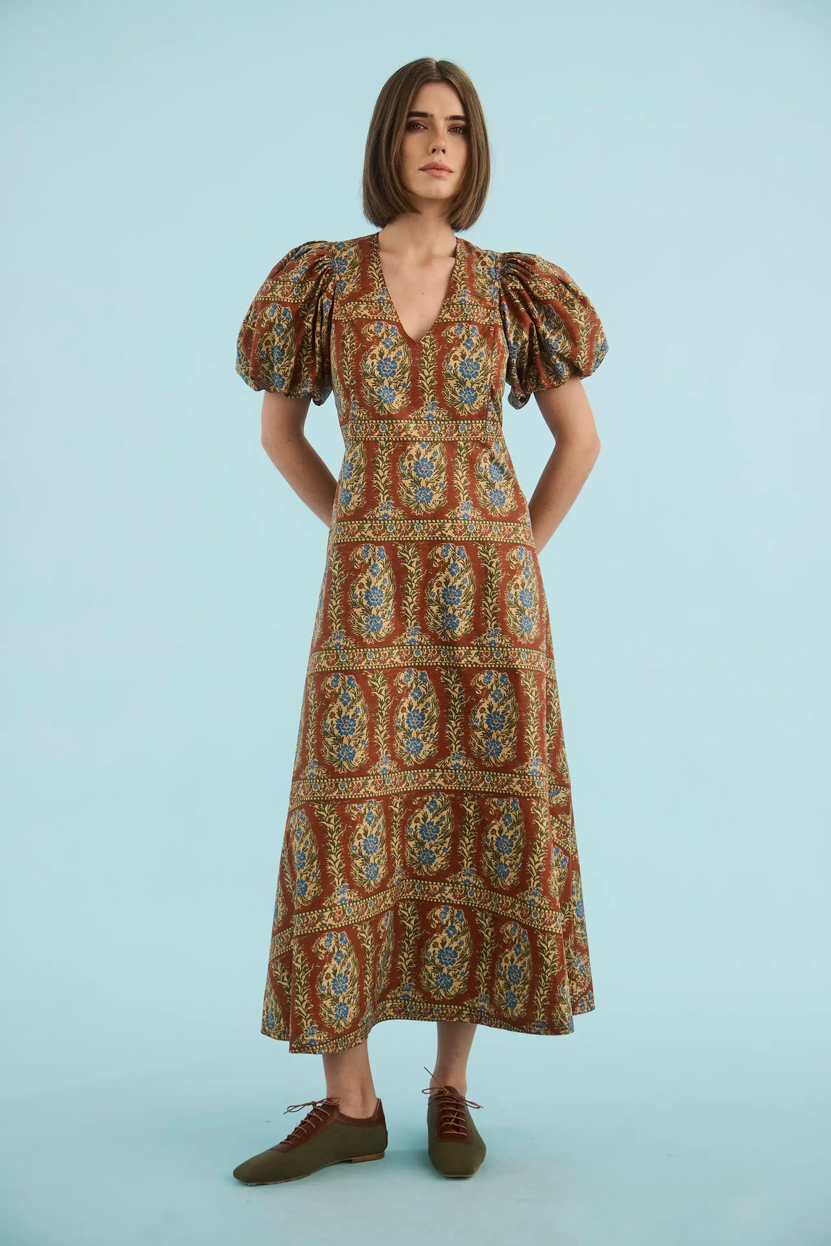 The Harrison Dress in Amber Glen Brown. 