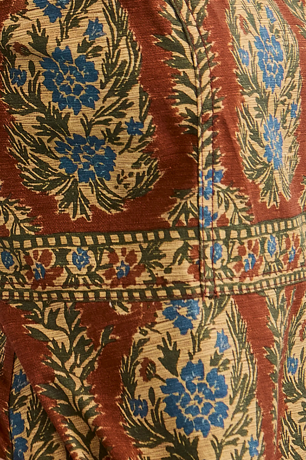 Close up of the Harrison Dress in Amber Glen Brown. 