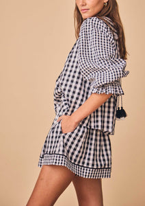 The Jemma shorts, made of a lightweight cotton, have a smocked elastic waistline and a flowy fit.