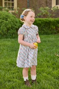 Little English traditional children's clothing. Short sleeve peter pan dress in blue, pink, and brown Wilmington Plaid with brown corduroy piping and bow details for little girls.
