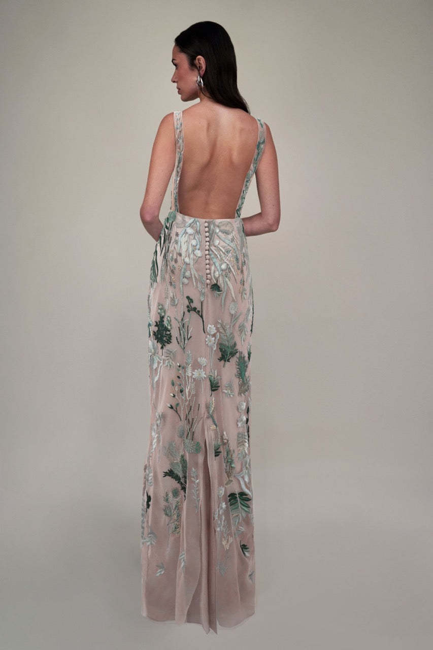 Back view of Underwater Wildflower column dress in seaglass showcasing low open back, fabric-covered button row, and embroidered floral tulle