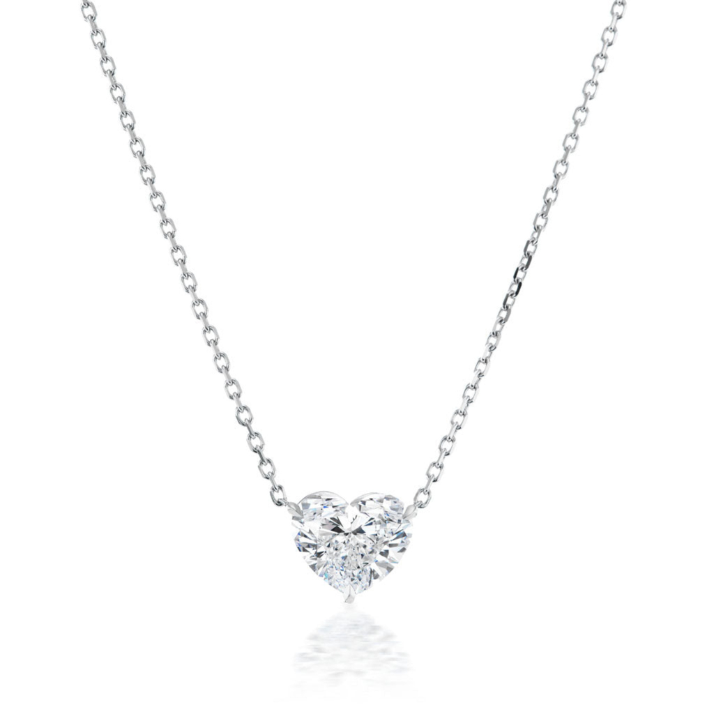 The Heart-Shaped Diamond Solitaire Pendant features a sparkling 1.71 carat diamond on a delicate silver chain, showcased against a white background.