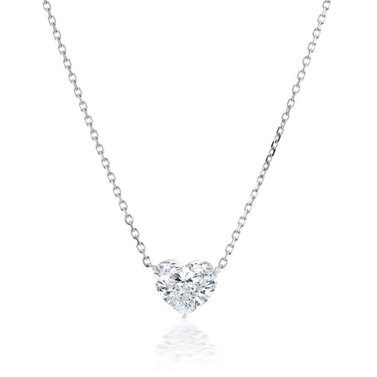 The Heart-Shaped Diamond Solitaire Pendant features a sparkling 1.71 carat diamond on a delicate silver chain, showcased against a white background.