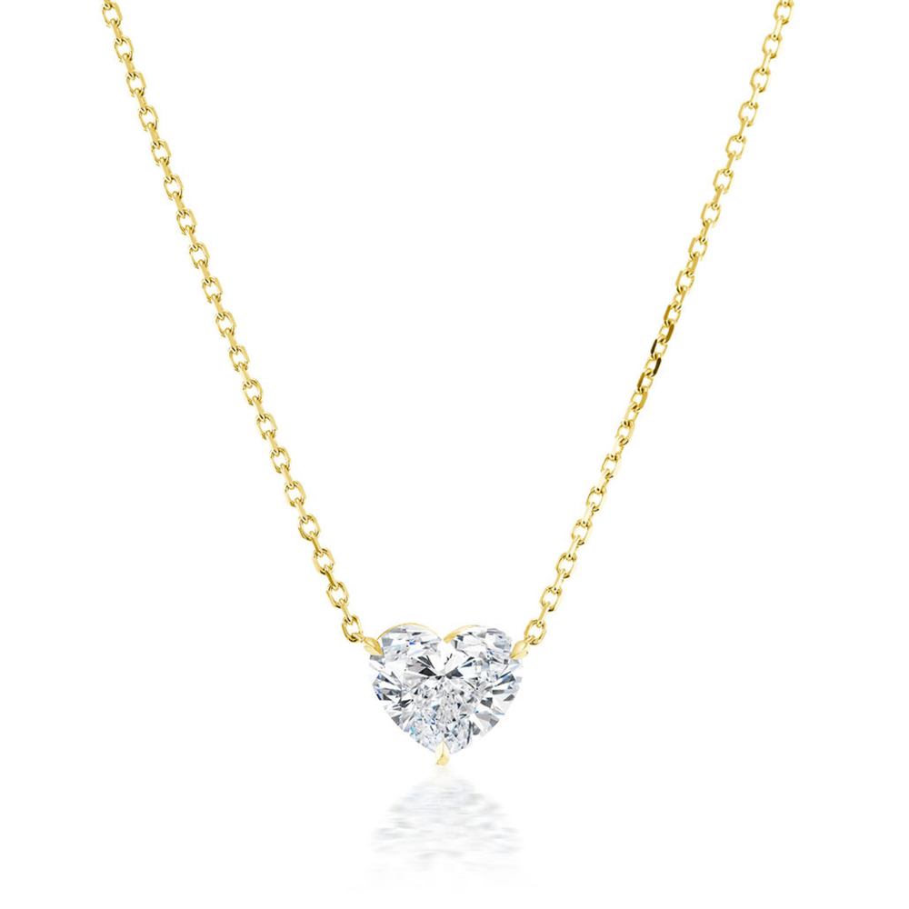 The Heart-Shaped Diamond Solitaire Pendant features a sparkling 1.71 carat heart-shaped diamond set in an elegant 18k gold necklace, shown against a plain white background.