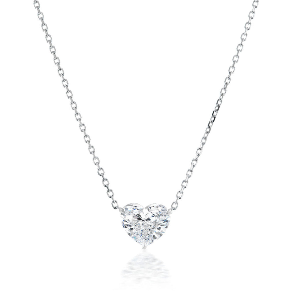The Heart-Shaped Diamond Solitaire Pendant features a sparkling 1.71 carat diamond on a delicate silver chain, showcased against a white background.