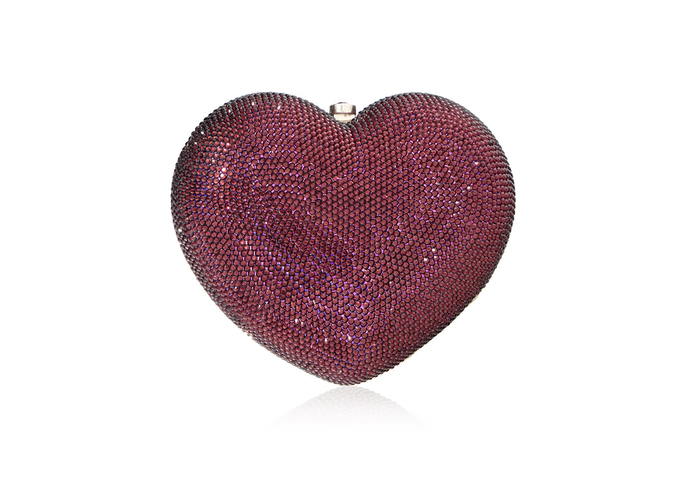 Front view of Petit Coeur L’Amour heart-shaped crystal clutch in amethyst showing all-over purple crystals on white background