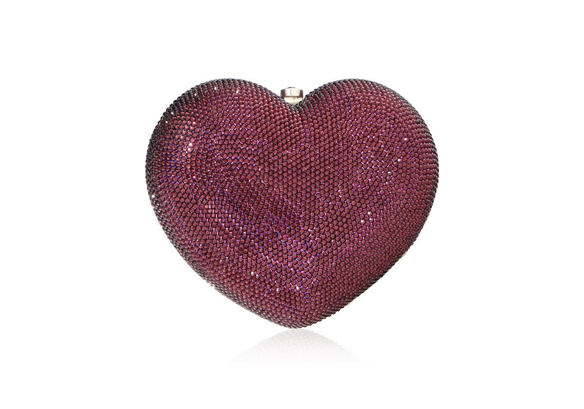 Front view of Petit Coeur L’Amour heart-shaped crystal clutch in amethyst showing all-over purple crystals on white background