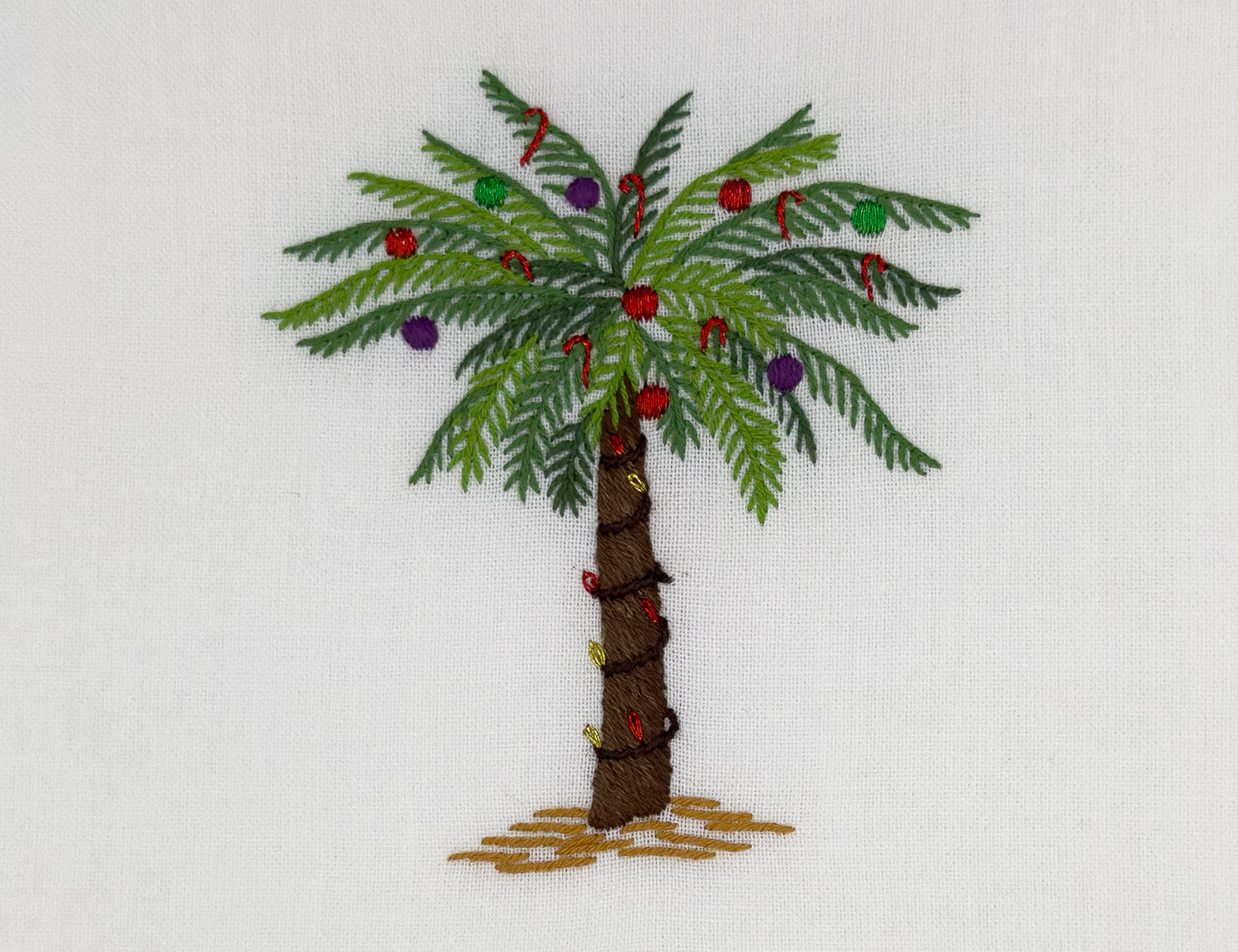 Image of a Henry Handwork Holiday Palm motif.