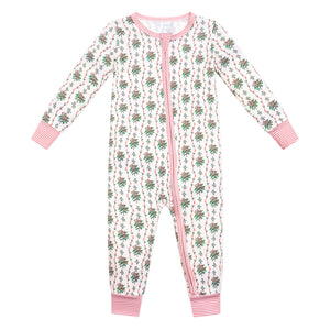 Front view of Holly Baby Snap Onesie showcasing hand-drawn greenery and red berry print with pink trim on a white background