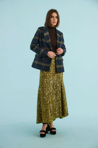 The Huntley Blazer in Stirling Plaid paired with the Lindsey Skirt in Moss Sequin. 