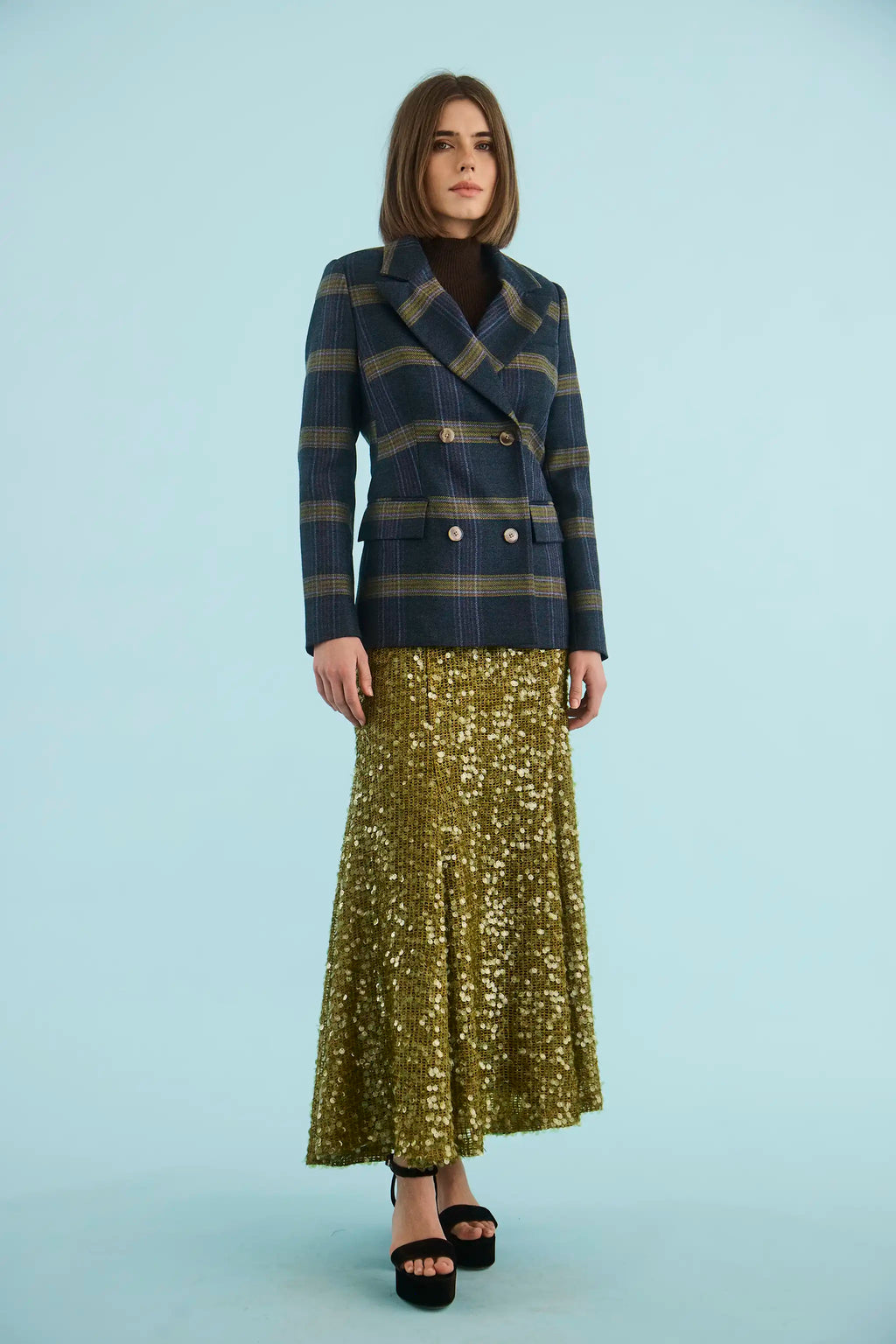 The Huntley Blazer in Stirling Plaid paired with the Lindsey Skirt in Moss Sequin. 