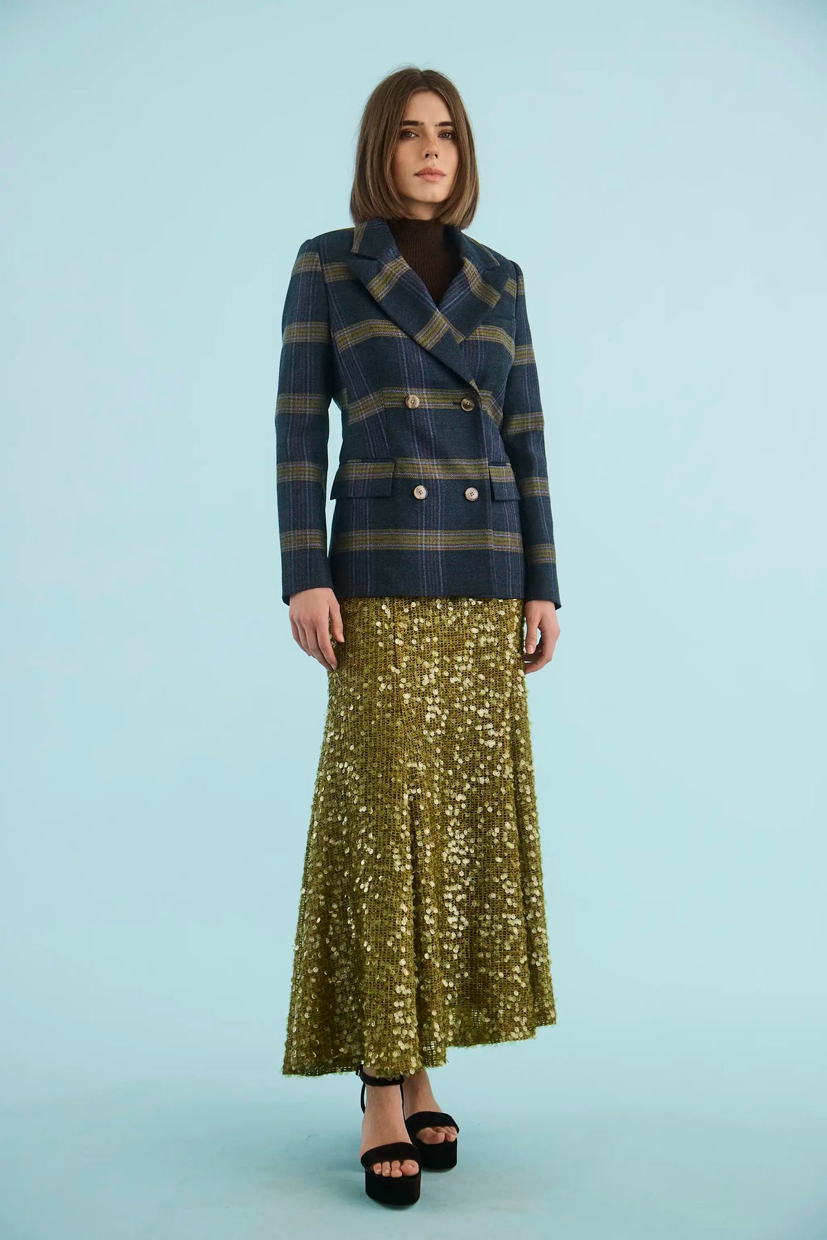 The Huntley Blazer in Stirling Plaid paired with the Lindsey Skirt in Moss Sequin. 
