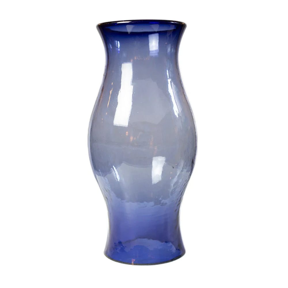 Front view of Hurricane vase in French blue showcasing its softly bulbous hand-blown glass shape and flared top against a white background