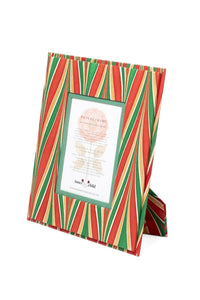 Front three quarter view of hand marbled 5x7 picture frame showcasing red green and gold striped pattern on white background