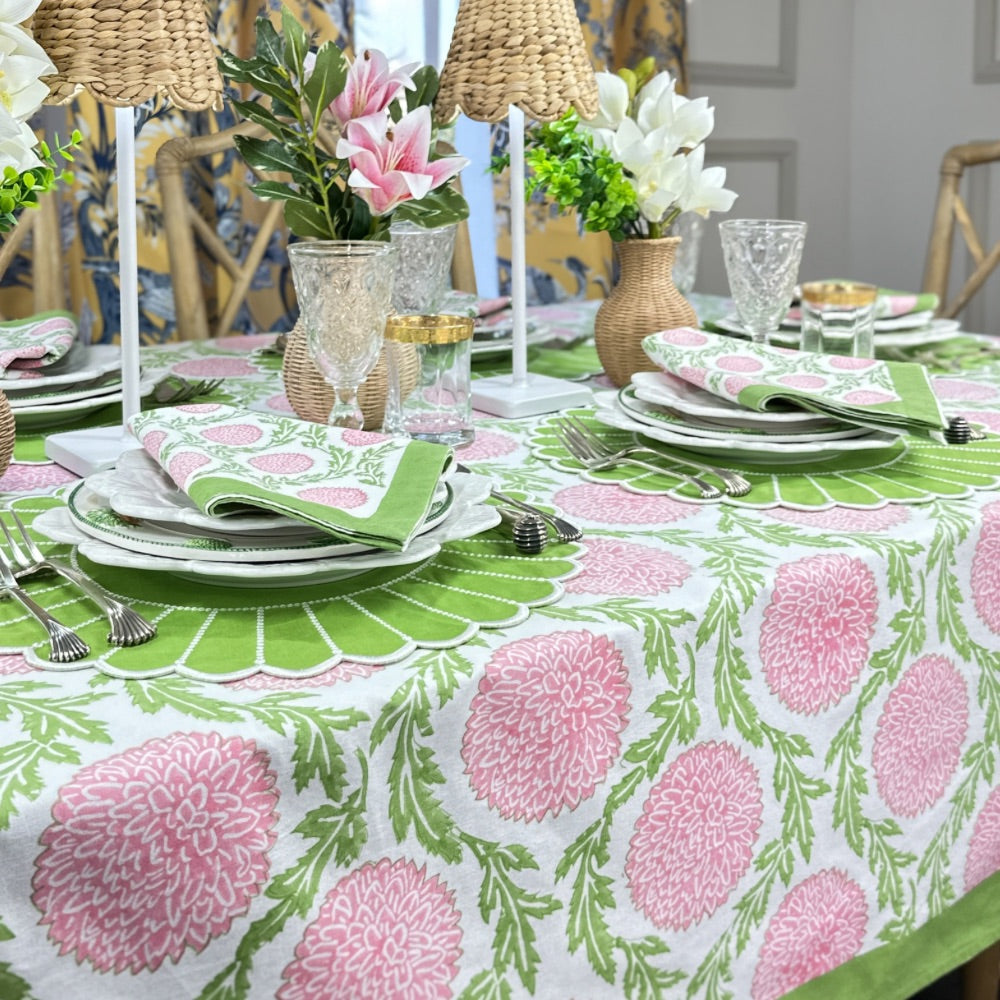 Hand block print pink and green tablecloth with floral design. 