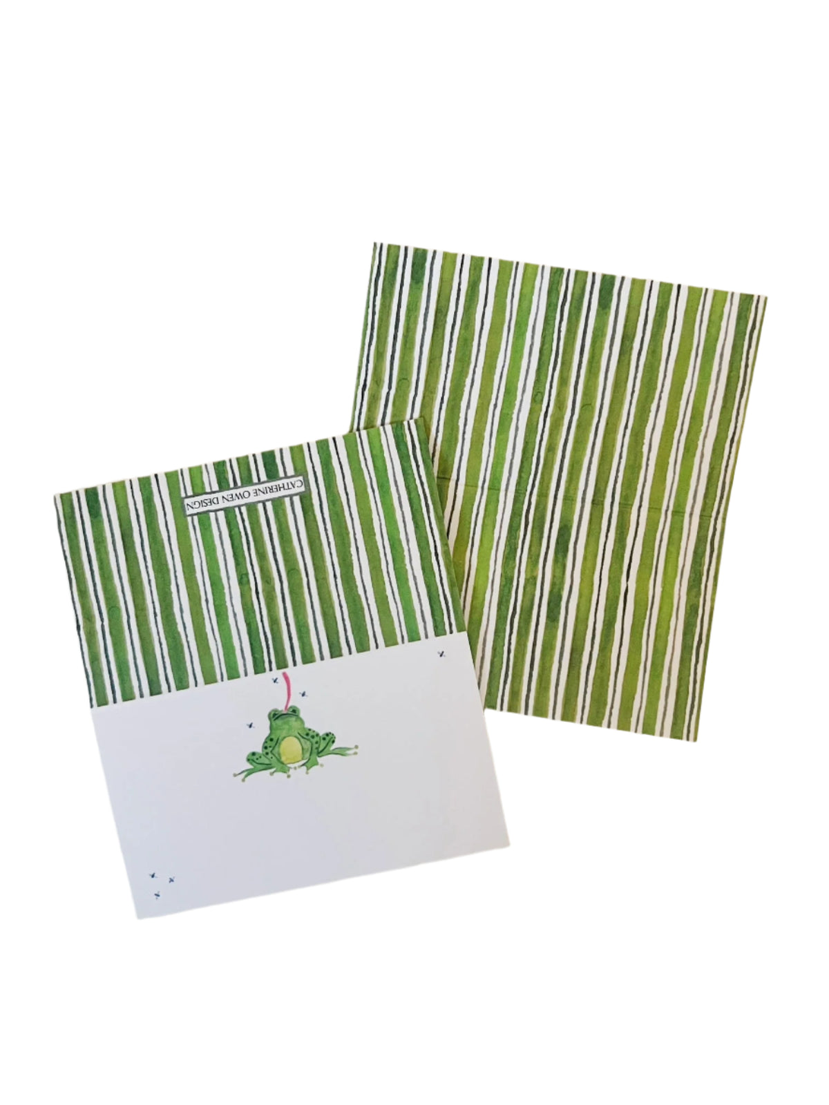 Angled view of folded Frog place cards showing green-and-white striped backs and a frog illustration on white fronts against a white background