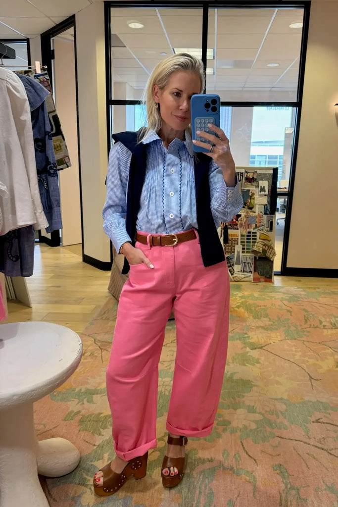 Blue and white gingham button down with a button front placket, shoulder puffing, and pintuck detail