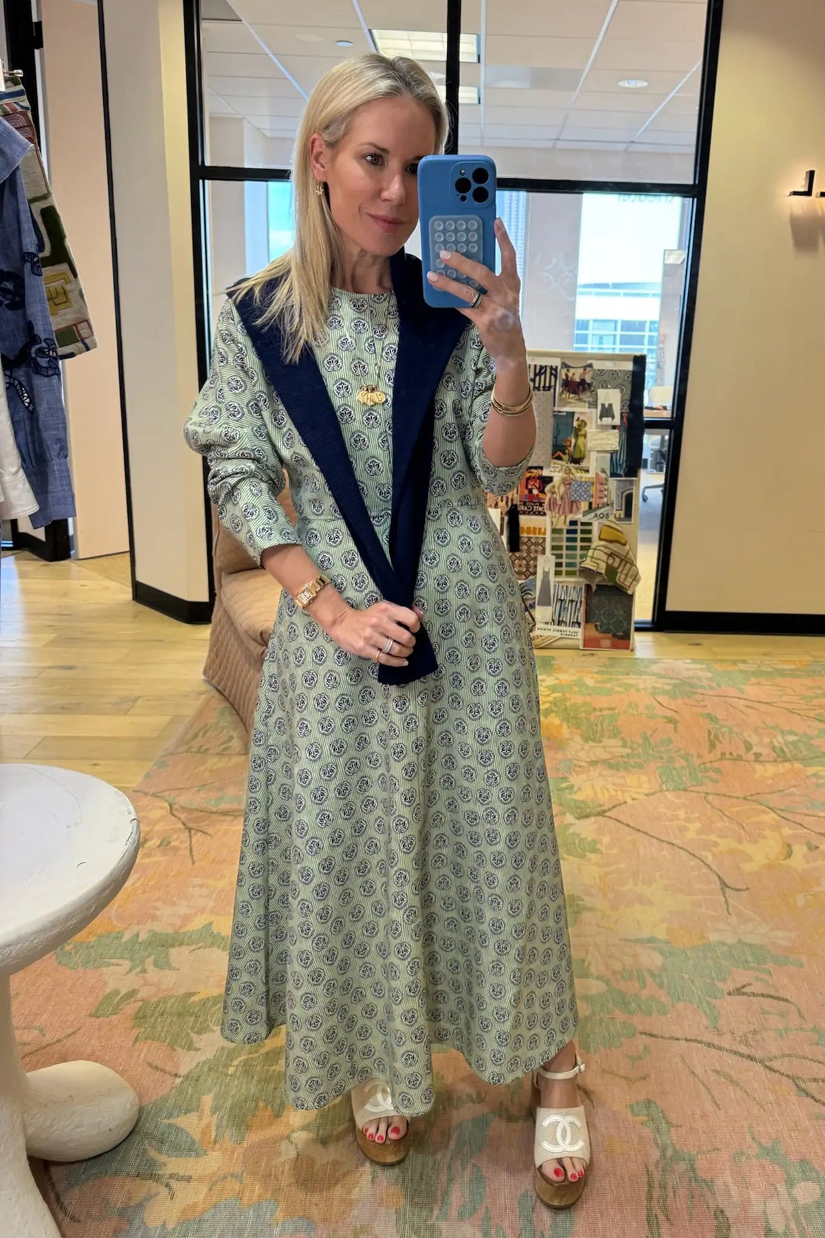 Midi dress with a clean crew neckline, modern dolman sleeves, with a circle-cut skirt.