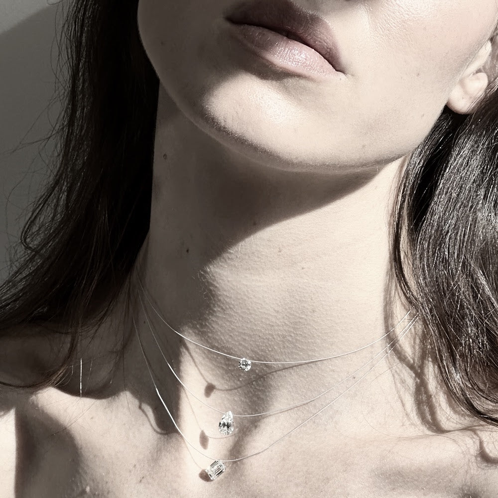 Pear Shaped “Floating” Diamond Pendant