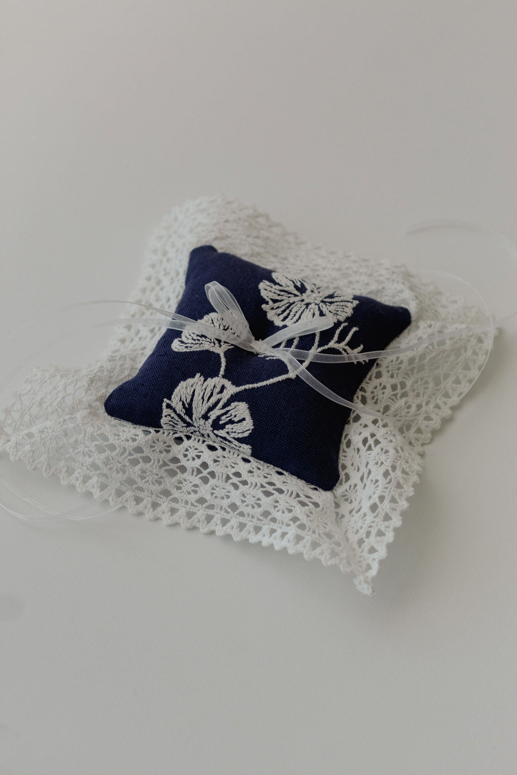 Cosmo Lace Pillow in Navy