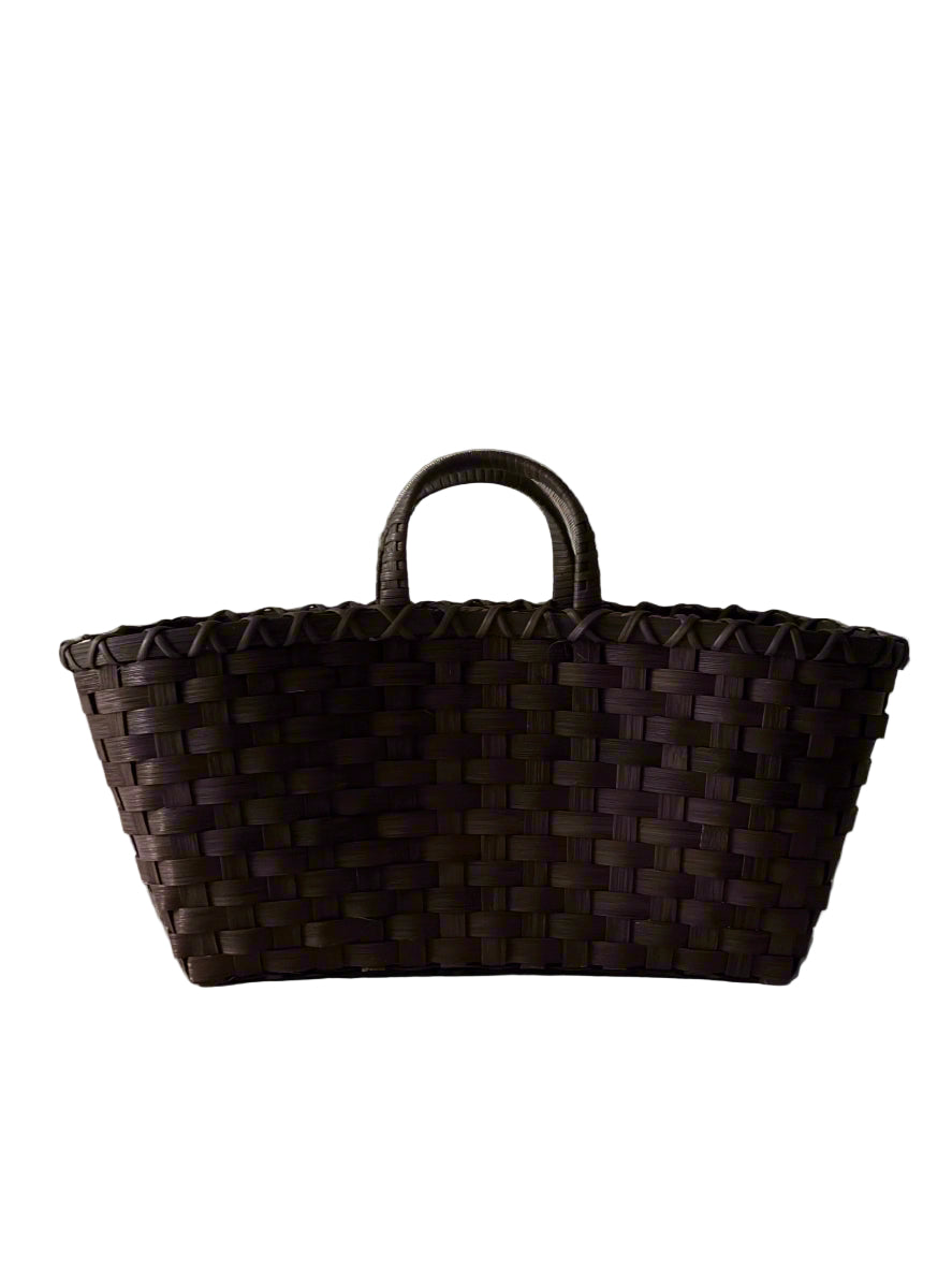 Brown woven basket on a light gray background