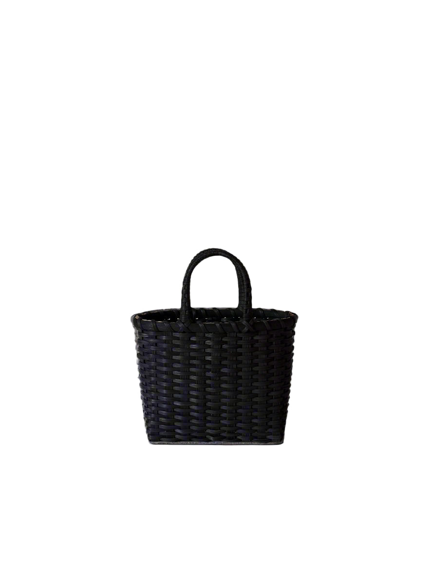Black woven handbag on a light gray background