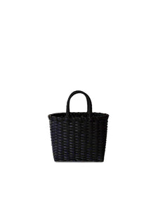 Black woven handbag on a light gray background